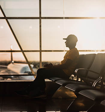 a person waiting for a flight