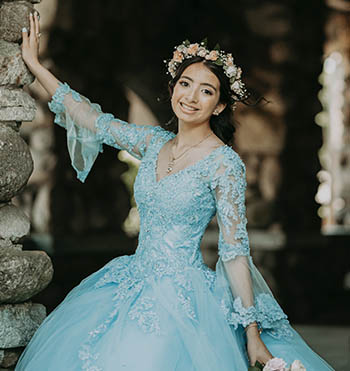 Gorgeous quinceanera on her gown